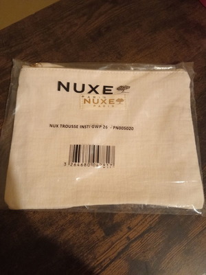 Nuxe υφασμάτινο νεσεσέρ 17x22 εκ. μπεζ με χρυσές λεπτομέρειες