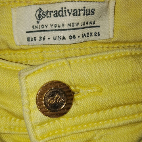 Stradivarius pastel yellow skinny jeans like new, distressed style