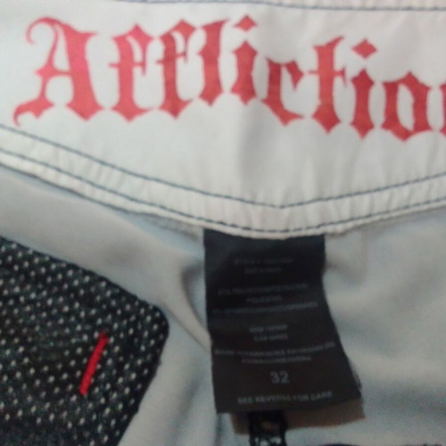 Affliction shorts used, size 32
