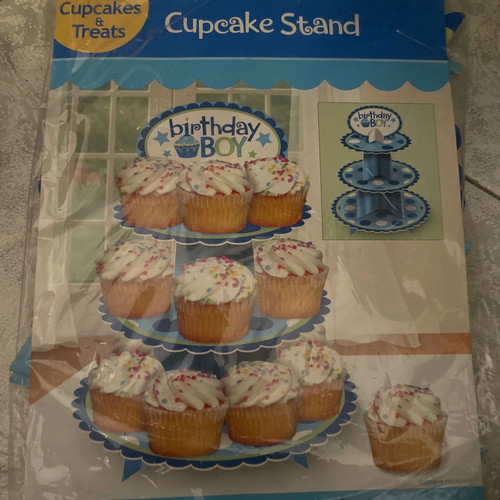 Cupcake stand used for birthday boy