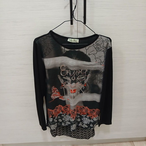 Black blouse with girl print and transparent lace back, like new, size L