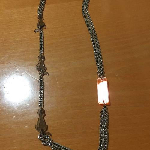 .LAK necklace with silver chain and cat details like new