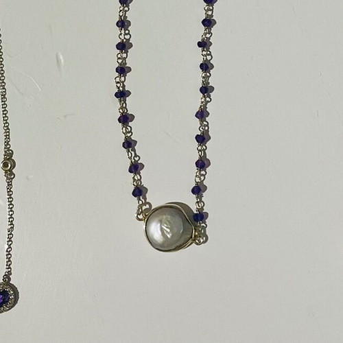 Set of three silver necklaces used