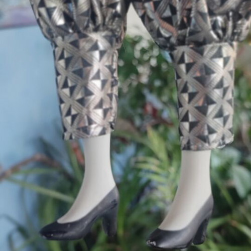 Porcelain Harlequin doll