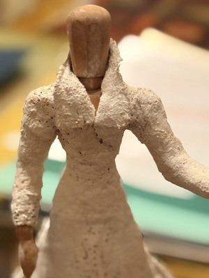 Handmade decorative doll with embossed dress used