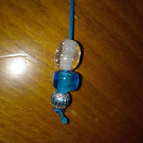 Small blue worry beads with eye stones