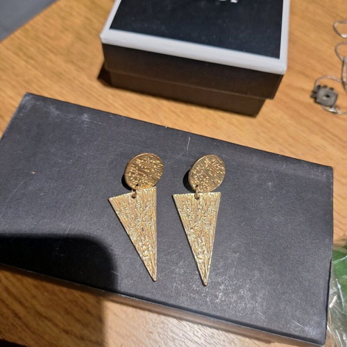 Dangling earrings used, gold-colored, in very good condition