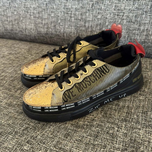Love Moschino women's sneakers size 39 like new, black and gold
