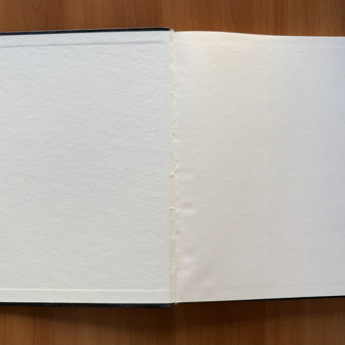 Black sketchbook with fabric cover, 127 sheets