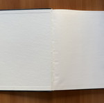 Black sketchbook with fabric cover, 127 sheets