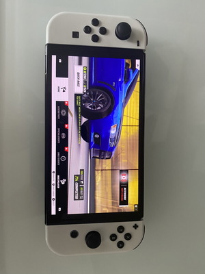 Nintendo Switch OLED used with original accessories and box