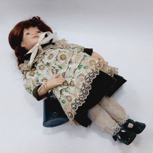 Vintage gardener doll with original outfit and watering can