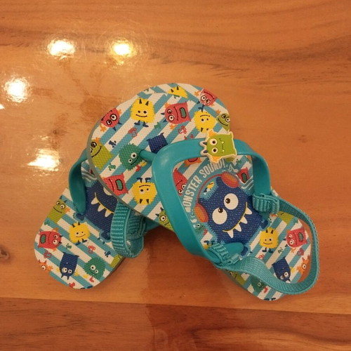 Children's summer slippers size 24/25 like new, light blue with monsters