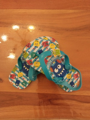 Children's summer slippers size 24/25 like new, light blue with monsters
