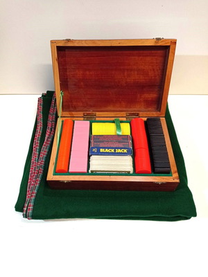Gambling game set used with chips in wooden box and felt