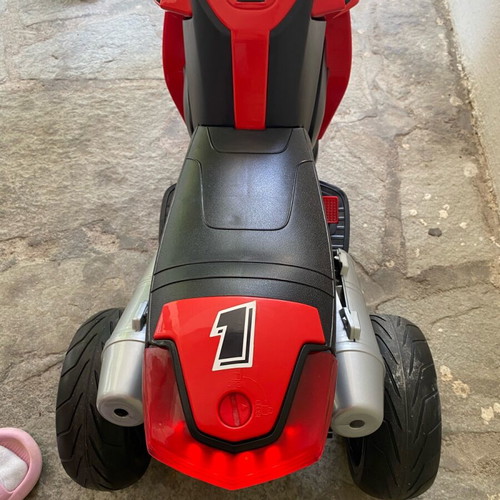 Electric children's motorcycle used with music