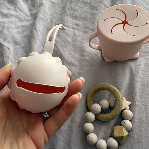 Baby silicone teething set, pacifier holder and training cup used