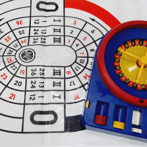 Vintage children's roulette game, like new, blue plastic, nylon mat