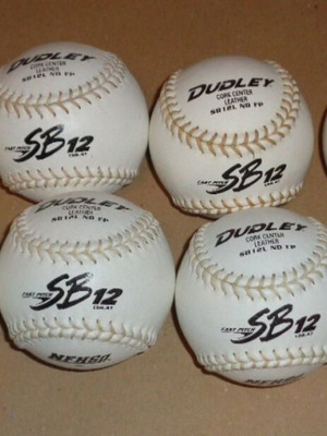 Dudley 12 inch white softball balls, eight like new