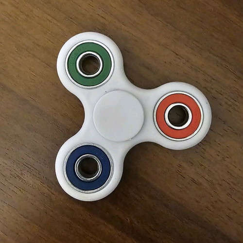 Fidget spinner used, white