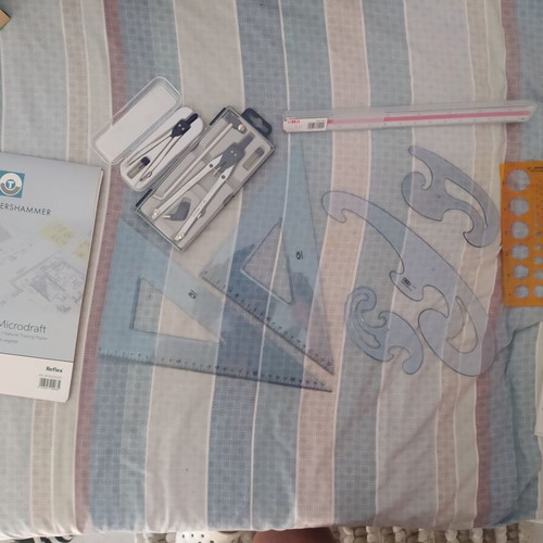 Drafting tools set new with rulers, compasses, and templates