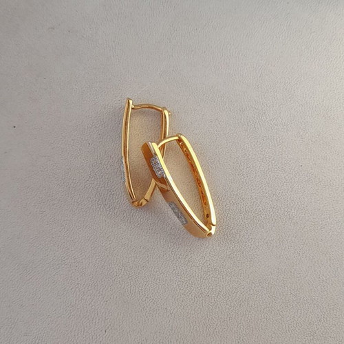 Steel hoop earrings in v line gold color new with white crystals