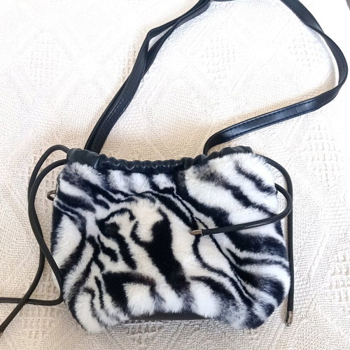 Fur pouch bag like new with zebra pattern crossbody