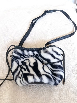Fur pouch bag like new with zebra pattern crossbody