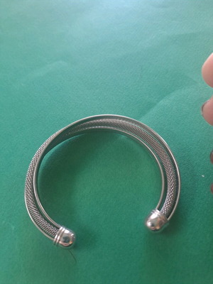 Stainless steel woven bracelet like new, silver