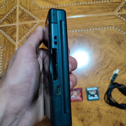 Nintendo DS Lite console with Pokemon Sapphire game used