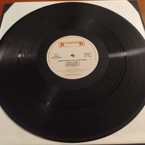 James Byrd's Atlantis Rising LP like new, metal