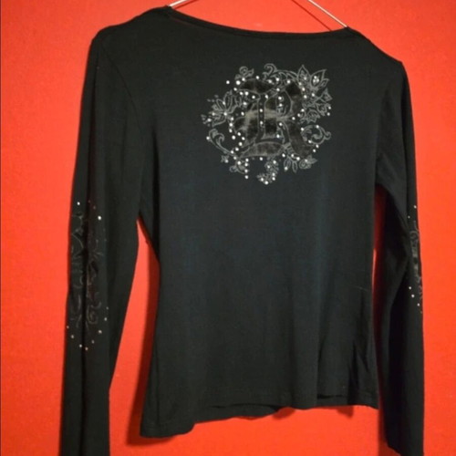 Black top with prints and rhinestones like new