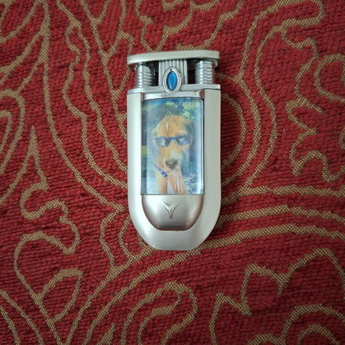 Vintage lighter with lenticular image like new, silver metal