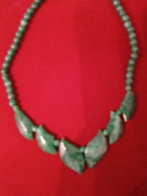 Necklace new with natural green stone