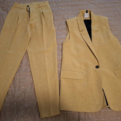 Eight suit like new, worn once
