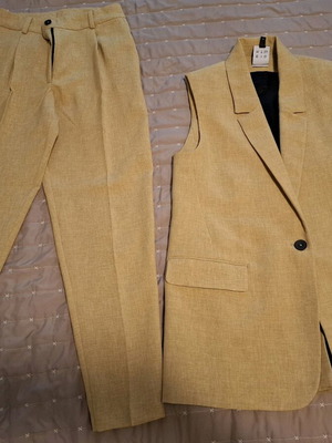 Eight suit like new, worn once