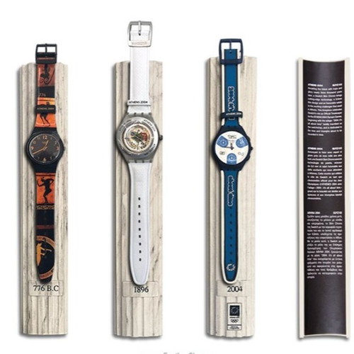 Collectible 2004 column with 3 Swatch watches new, numbered pieces