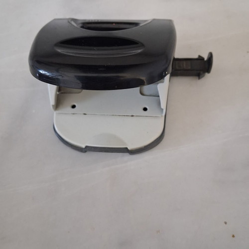 Office supplies set used with Leitz hole punch, Maestri stapler, Q-Connect calculator