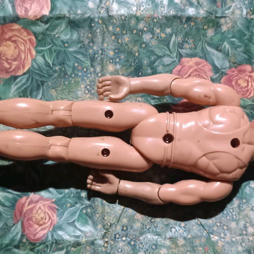 Plastic doll with movable limbs used