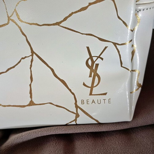 YSL - Yves Saint Laurent cosmetic bag new, white and gold