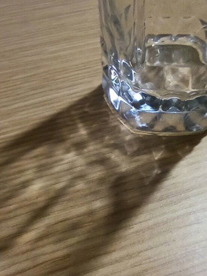 Water glass used, with DNA Aris, Elenas, Steliou