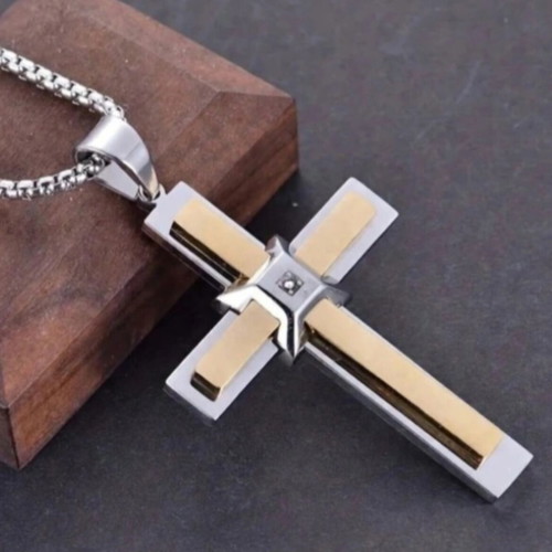 Elegant cross pendant with decorative stone and chain