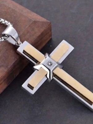 Elegant cross pendant with decorative stone and chain
