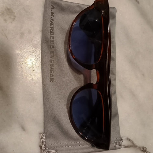 A.Kjaerbede sunglasses like new, unisex dark red frame with blue lens