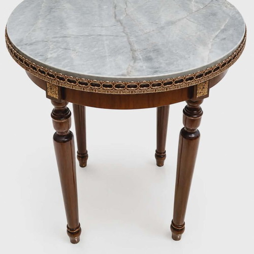 Vintage round coffee table with metal decoration and marble top like new
