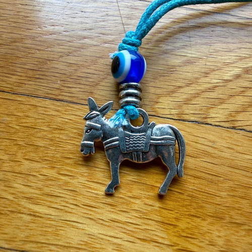 Donkey keychain like new with silver motif and blue eye bead