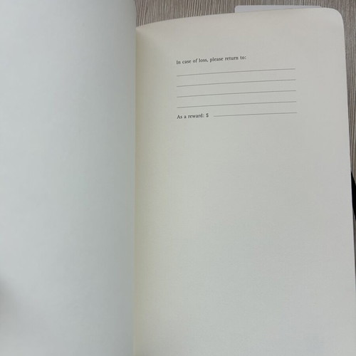 Moleskine black notebook with embossed cover