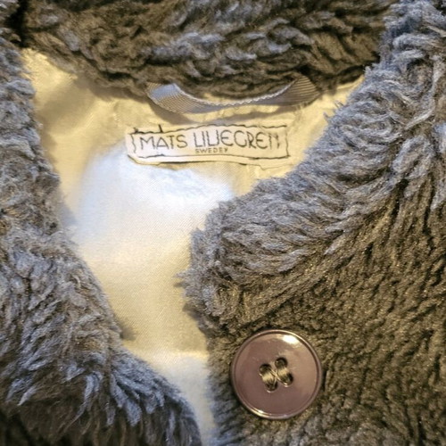 Vintage gray fur coat like new, with pockets and belt loops