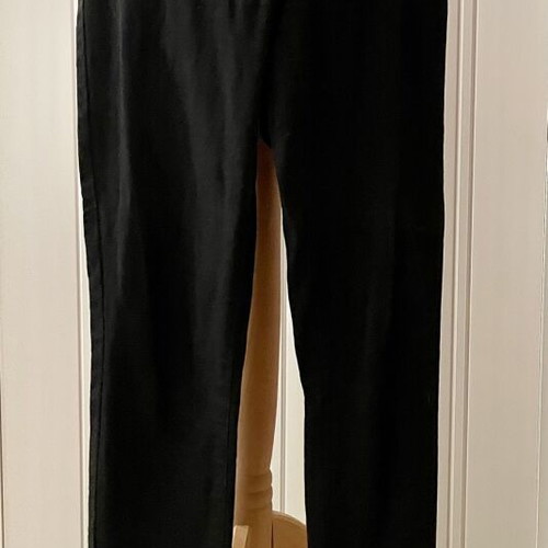 Fitted black denim pants used, elastic fabric, no zipper or buttons