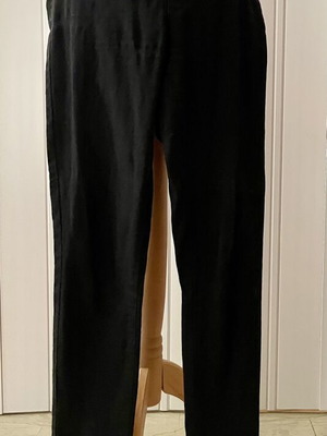 Fitted black denim pants used, elastic fabric, no zipper or buttons